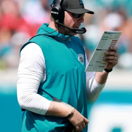 American Football Head Coach Liam Coen Jacksonville Jaguars Team Logo EverBank Stadium 2025 Blue Vest